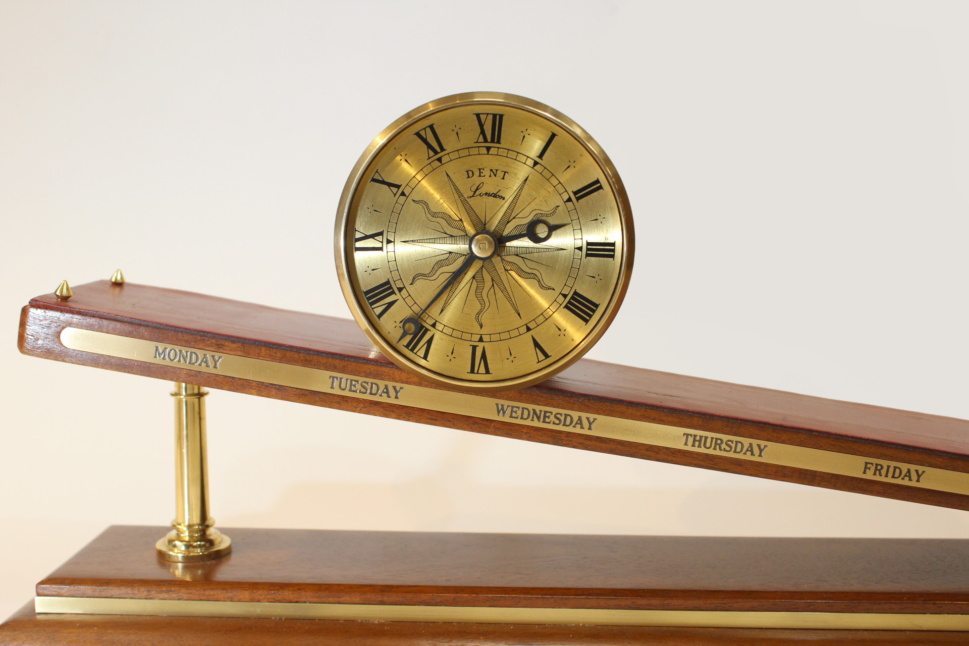 Small inclined plane gravity clock by Dent Carlton Clocks