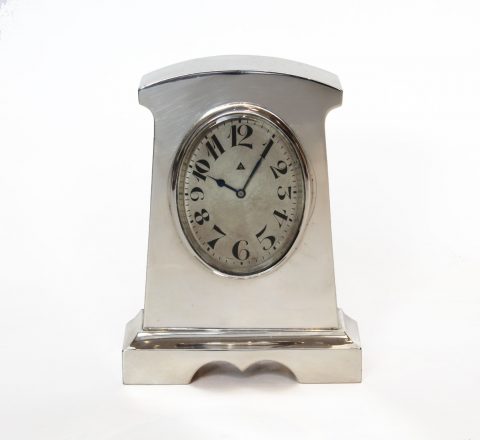 solid silver clock