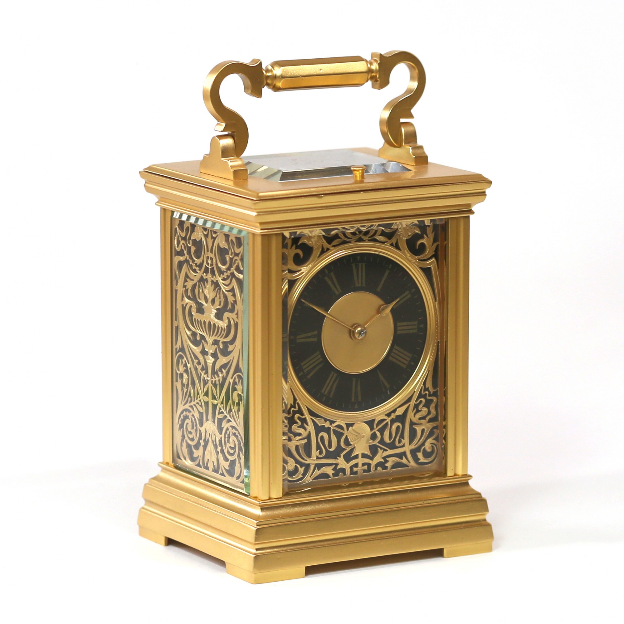 Gilt Repeating Carriage clock with Medieval theme Mask - Carlton Clocks